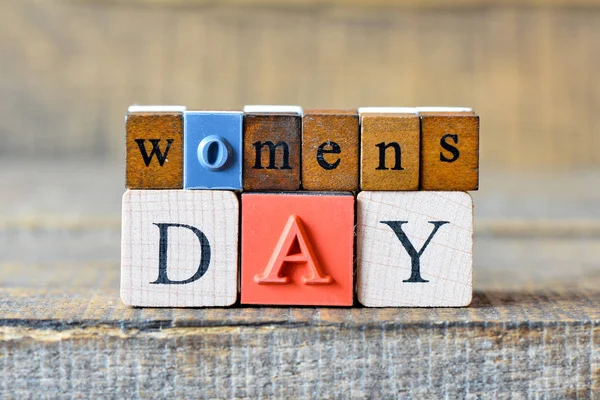 depositphotos_176141694-stock-photo-womens-day-march-wooden-cubes.webp